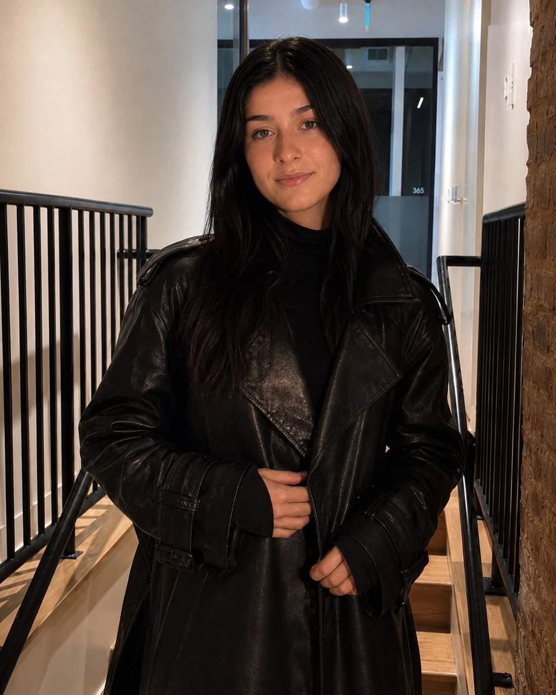 Close fashion portrait in black leather
